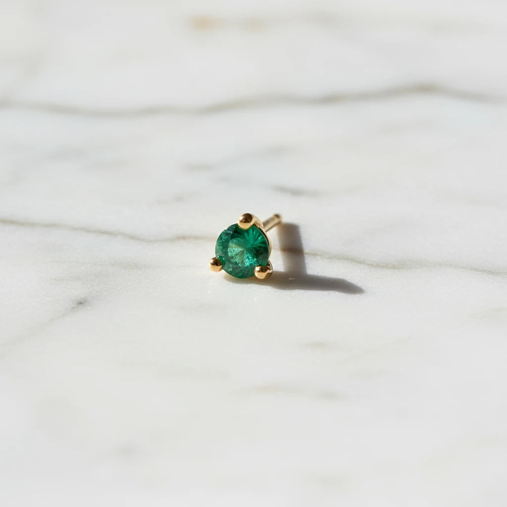 2mm Emerald Dot Stud (Single) by Jennie Kwon on a white background