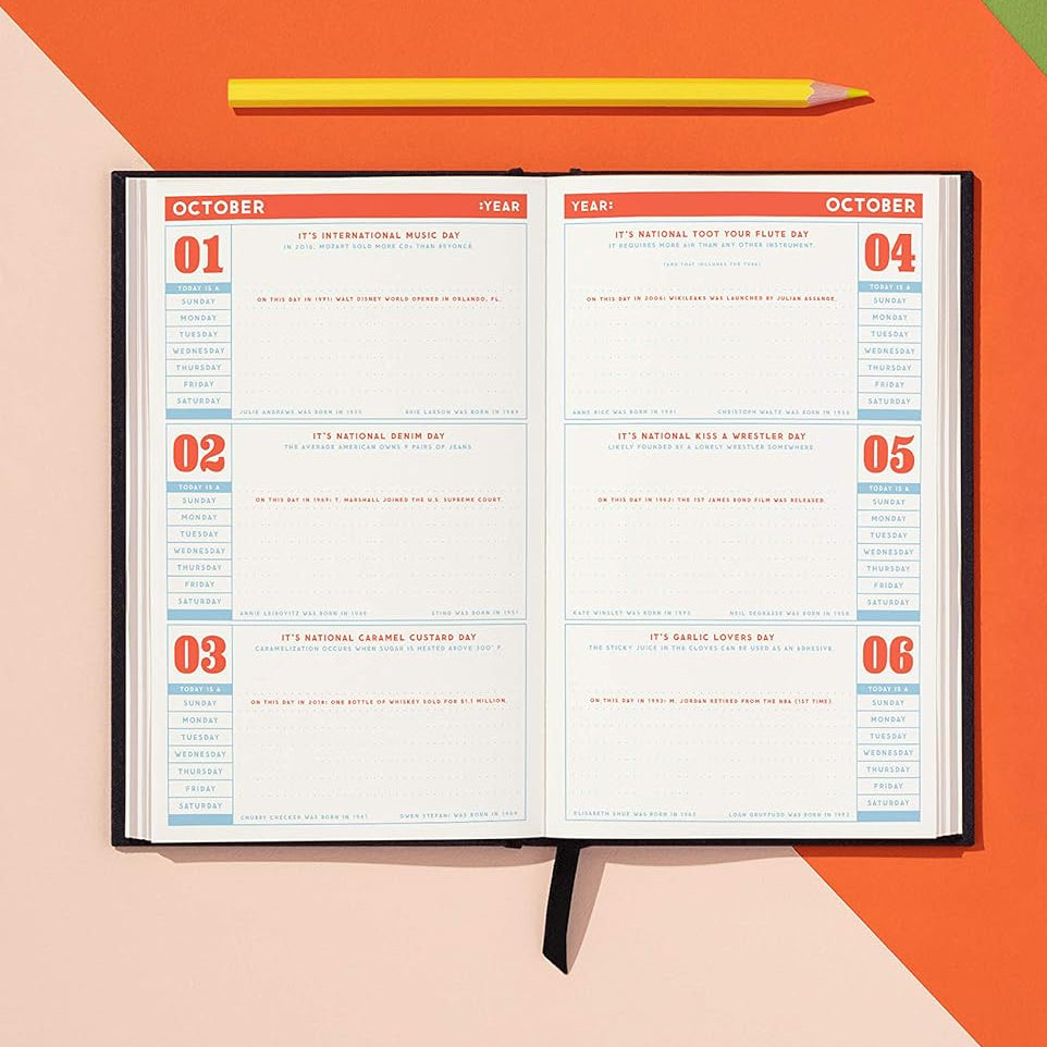 Open daily planner on a colourful background