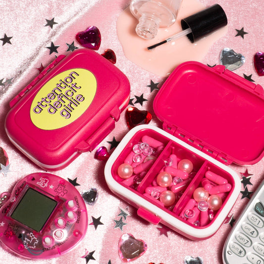 Pink pill box with attention deficit girlie print