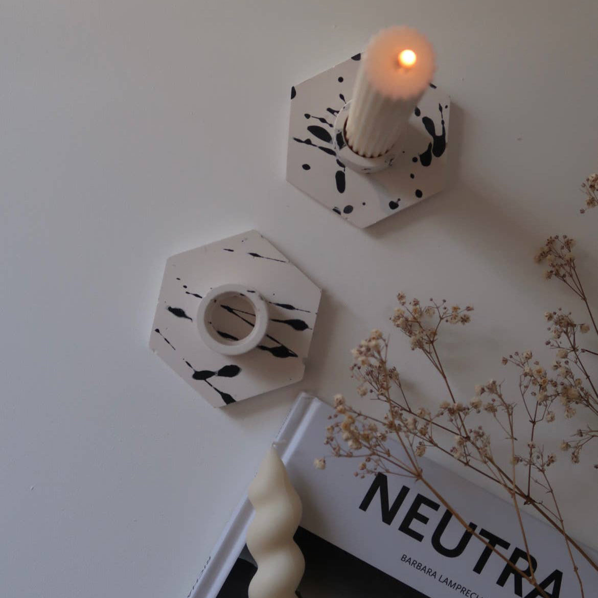 Geometric candle holder with splatter effect