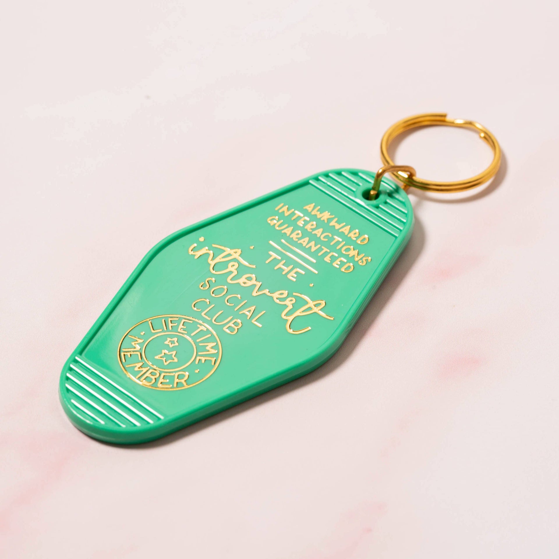 Keyring - the introvert social club - green