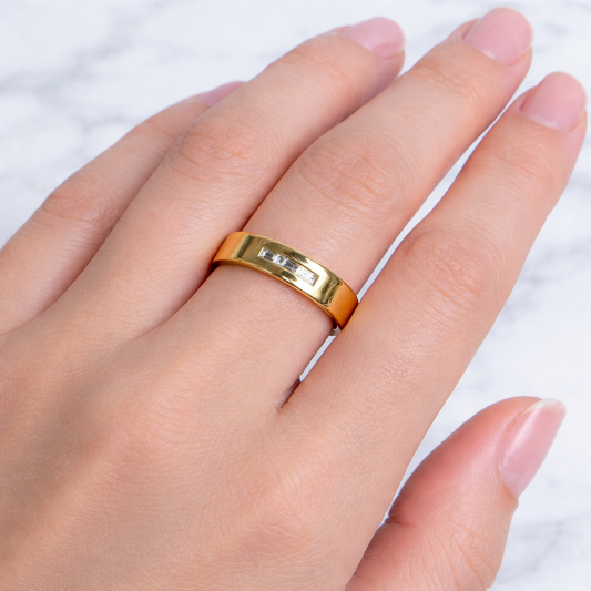 Jennie Kwon 3 baguette square band wedding ring - a wide gold band featuring three baguette cut diamonds set close together, creating a sleek and modern look.